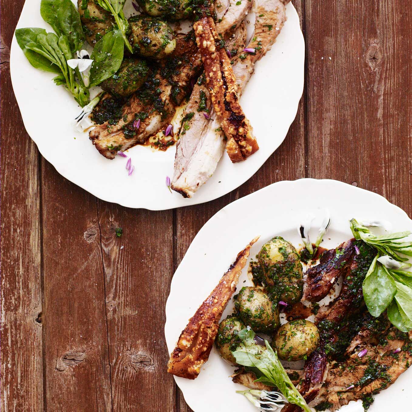 Roast pork with herbs, broad bean tops & new potatoes
