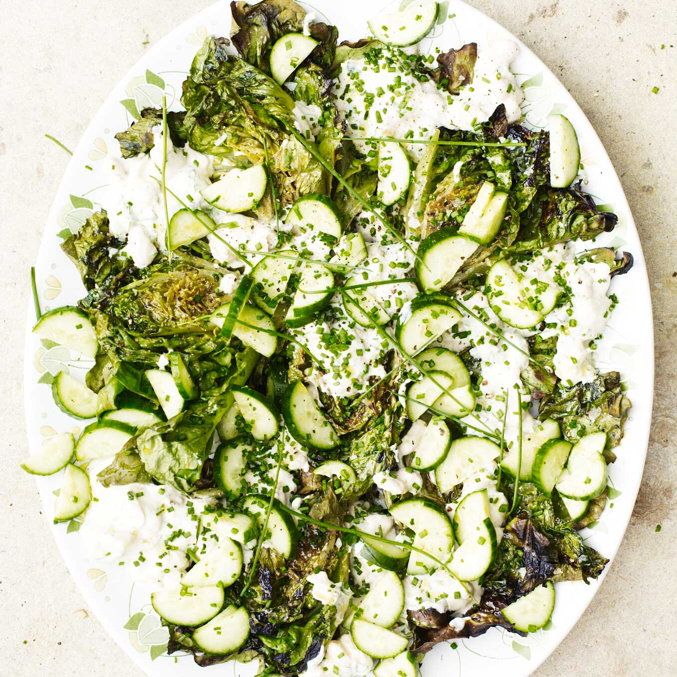 Barbecued little gems with cucumber, white beans & tahini