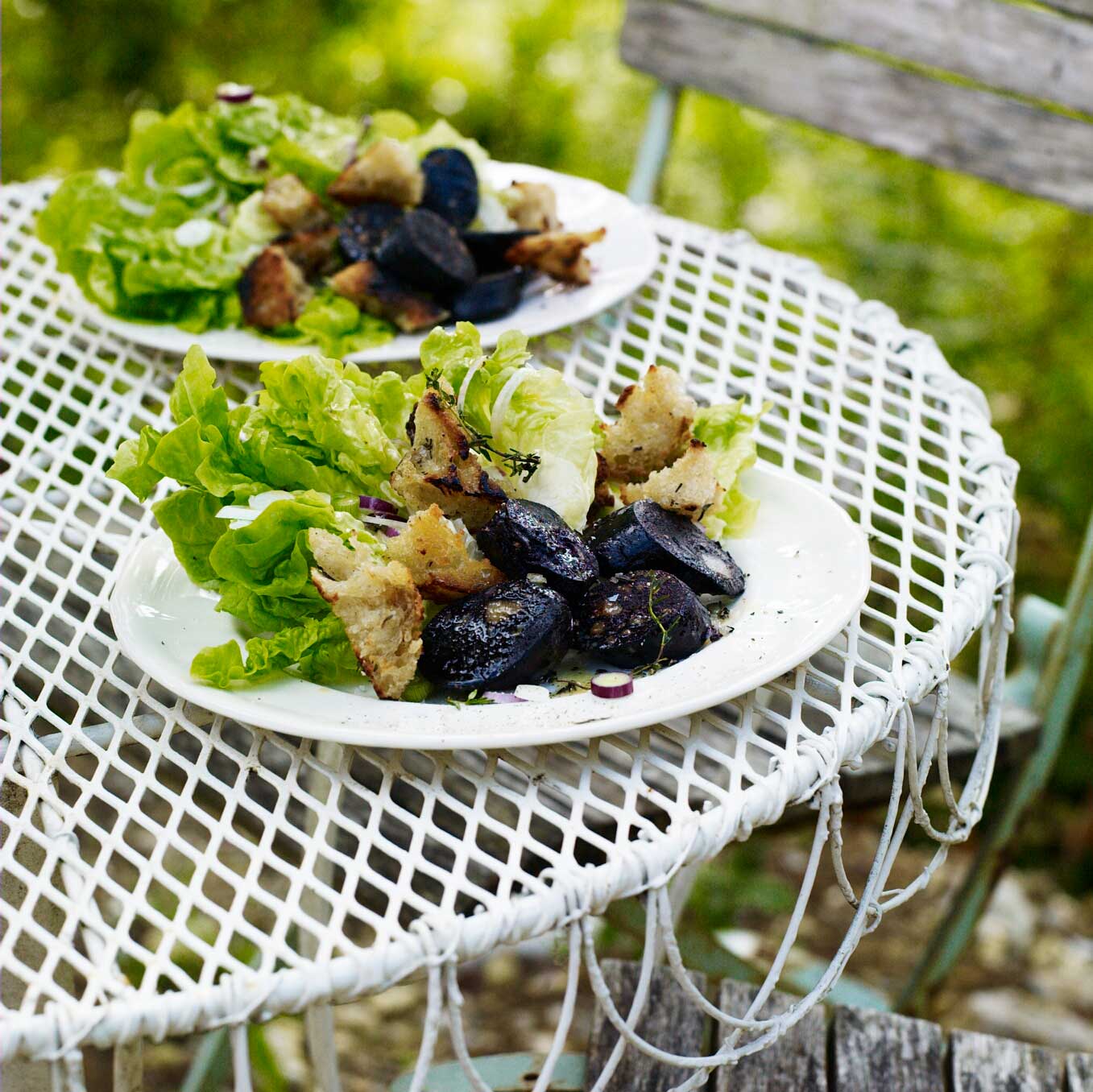 Lettuce with black pudding, thyme croûtons, & mustard dressing