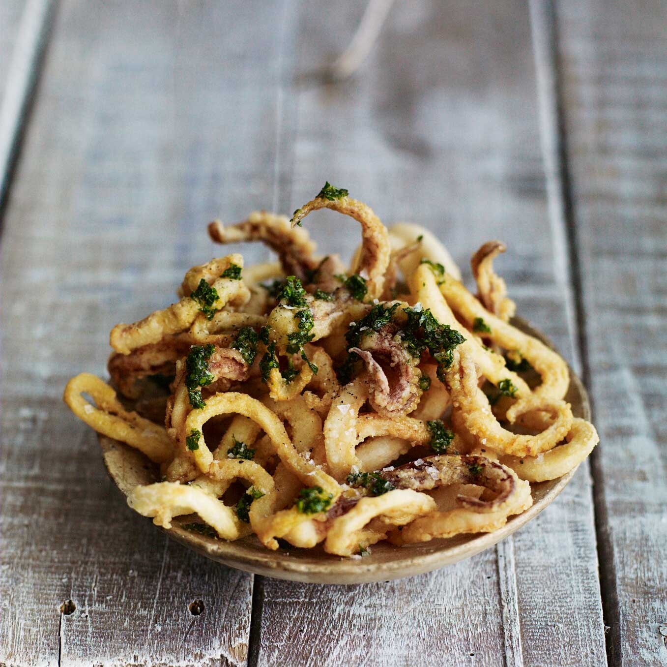Fried squid with garlic & parsley