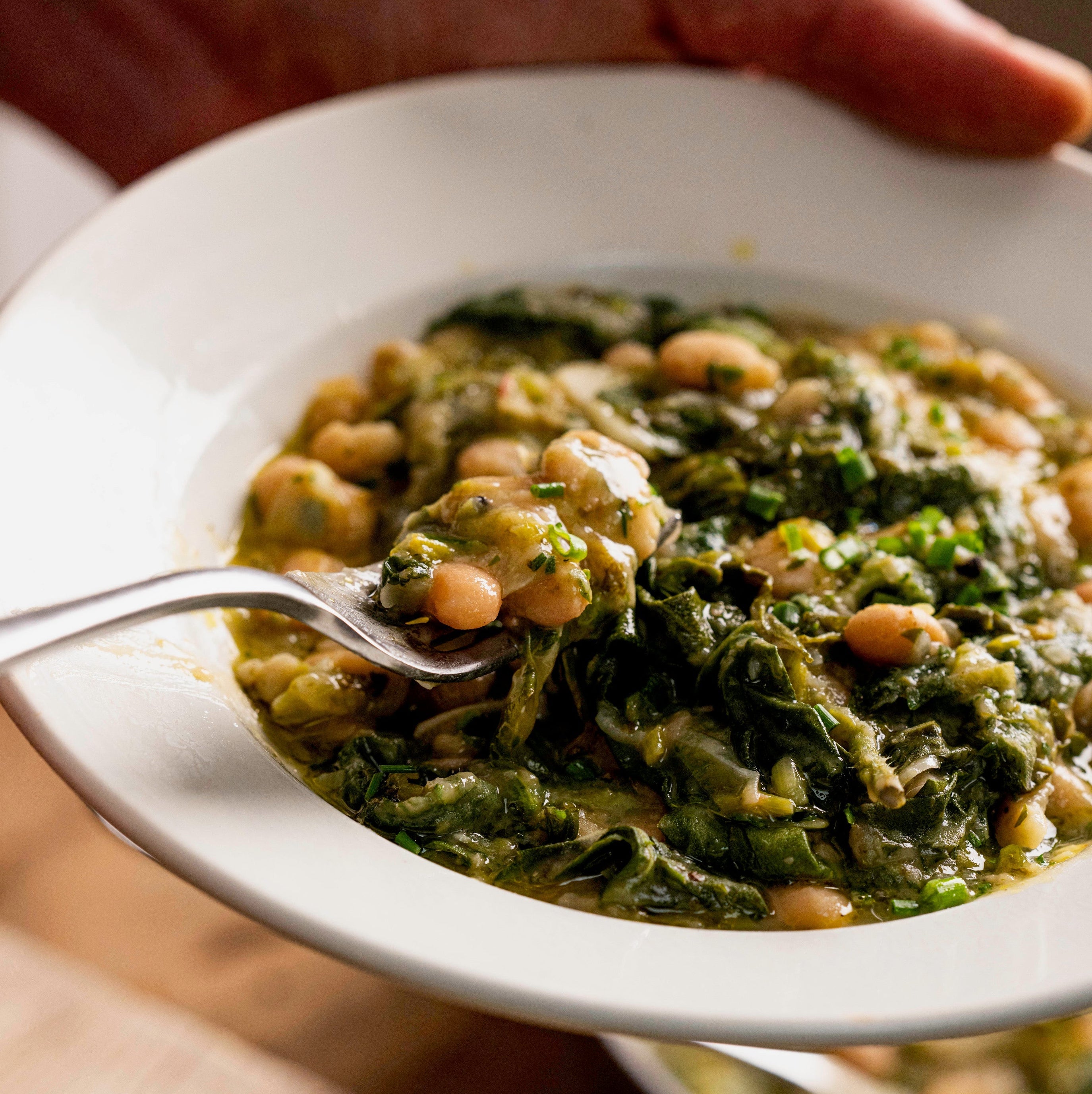 White beans with half the garden's greens