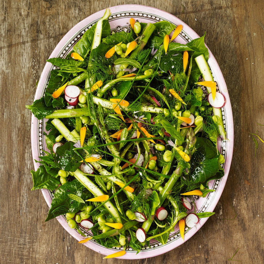 Sea beet and asparagus salad with baby broad beans and radishes