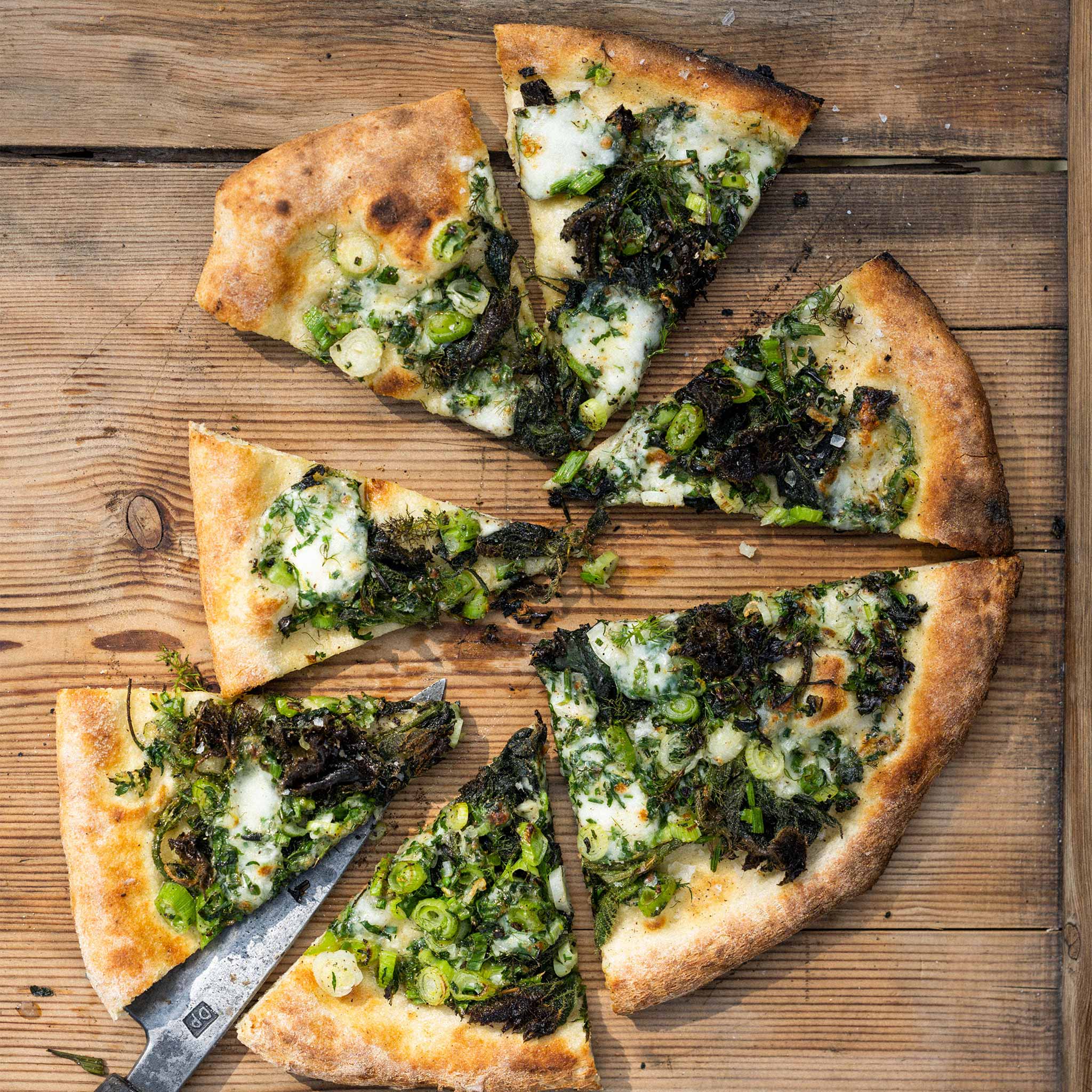Smoked haddock, ricotta, spinach and cheddar pizza