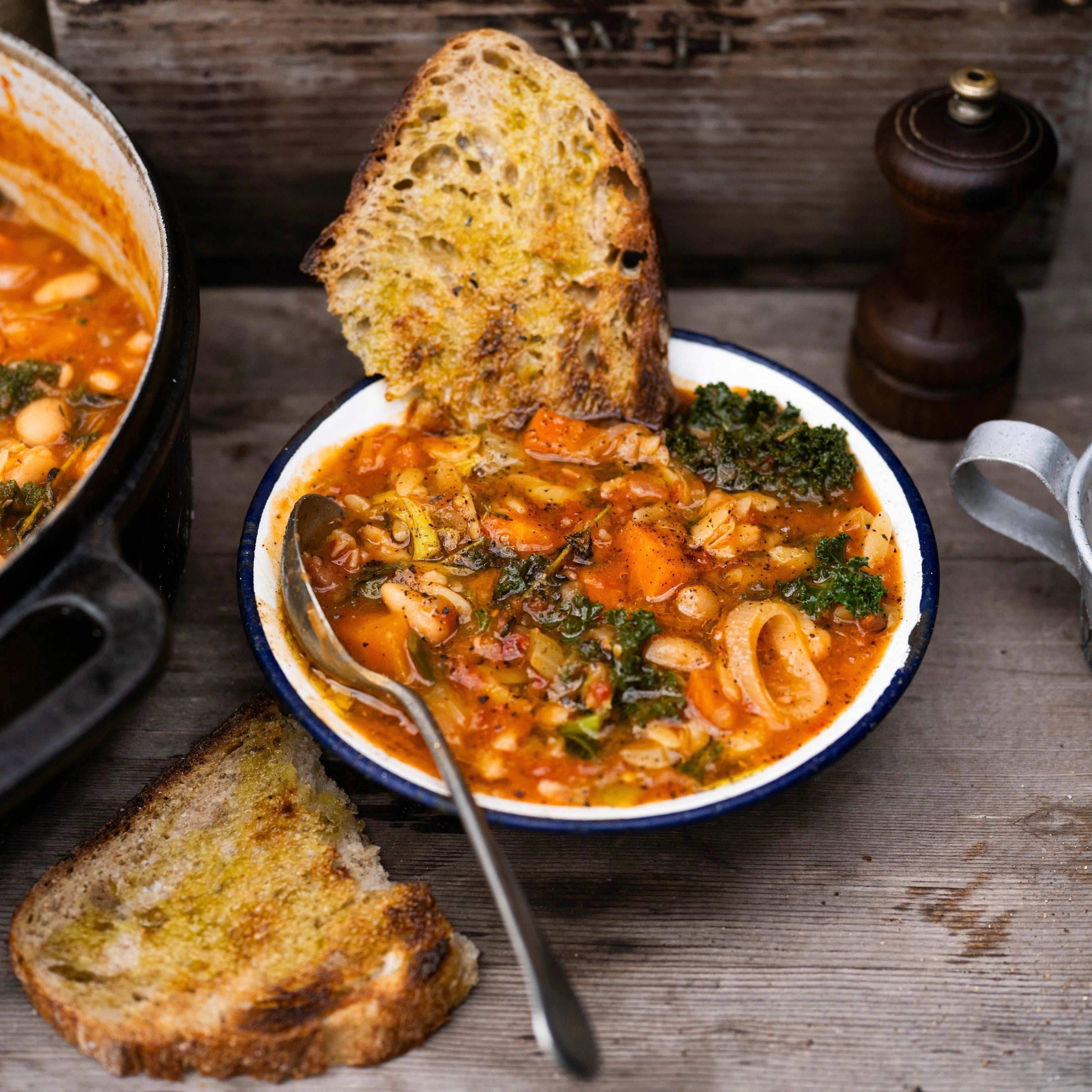 Winter soup with Orzo, smoked bacon, white beans and kale