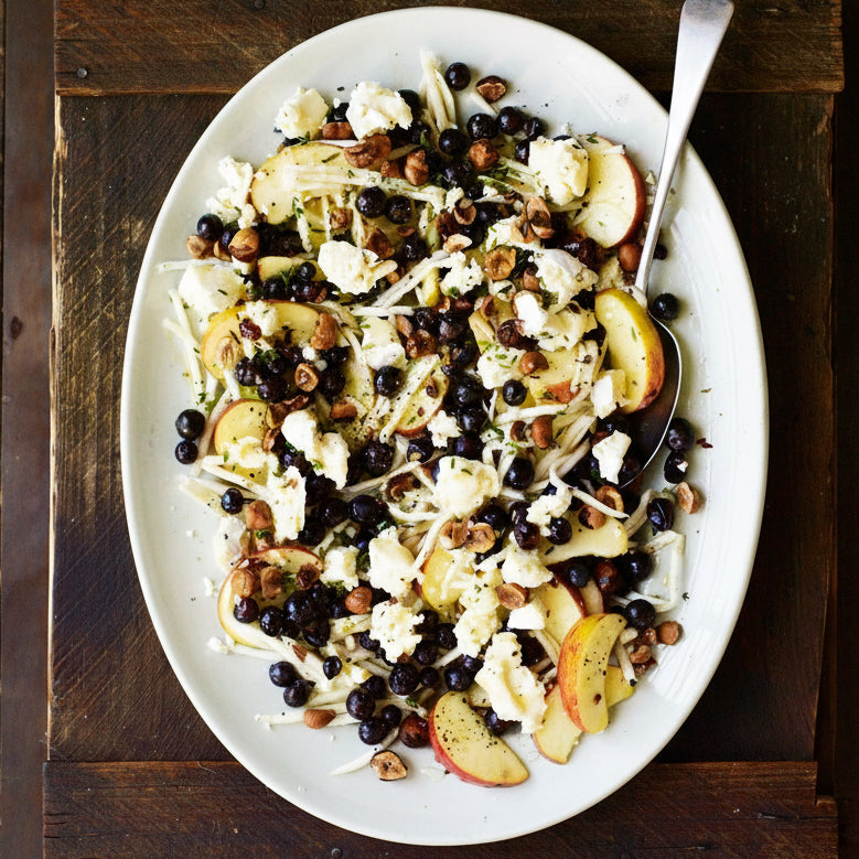 Grape, celeriac and apple salad with goat’s cheese and hazelnuts