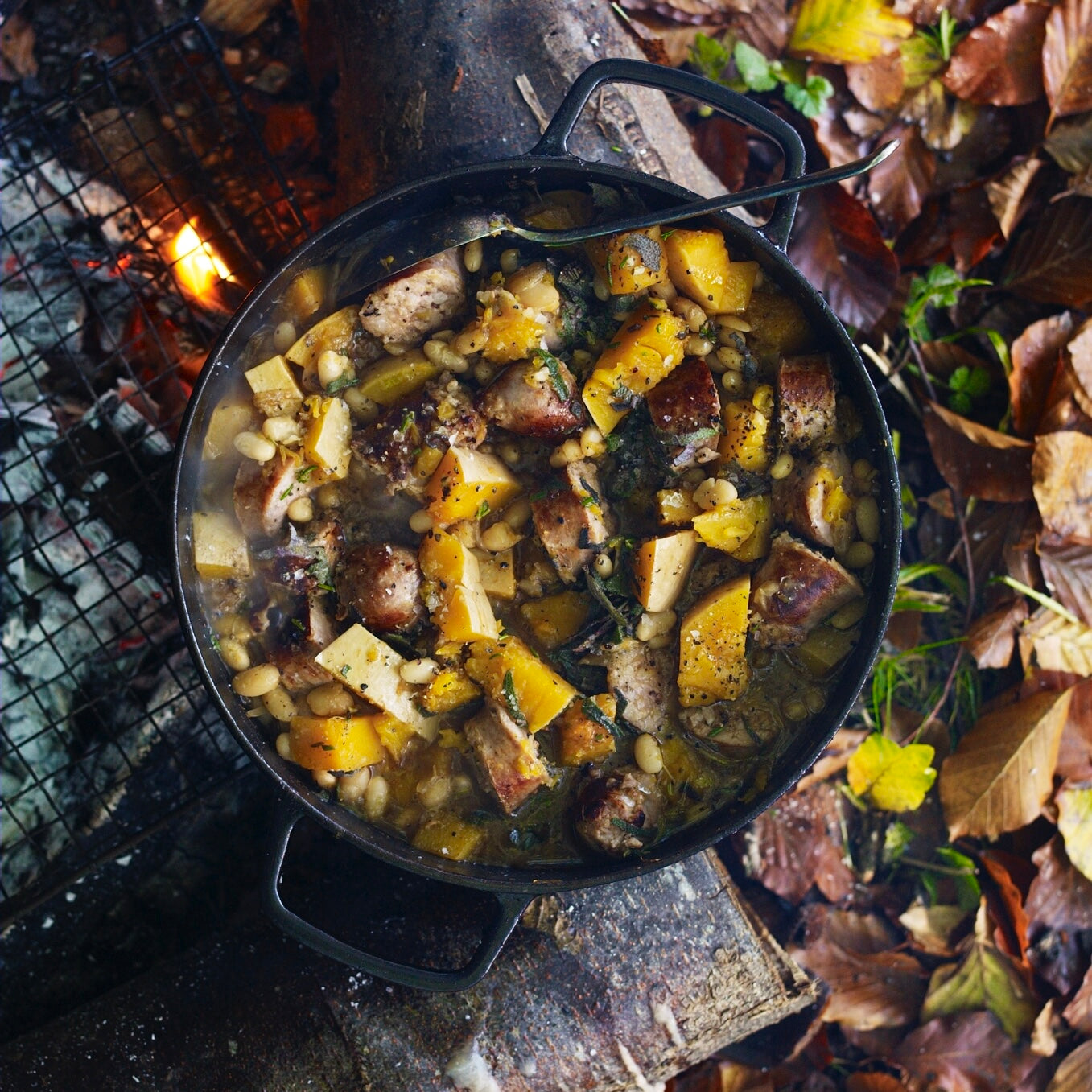 Sausages and squash with sage, rosemary and beans