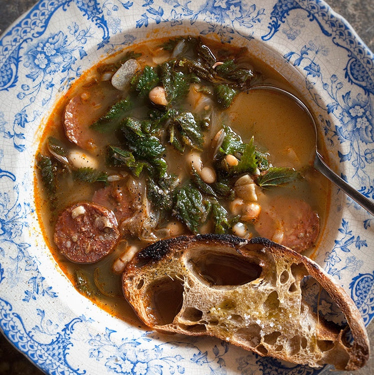 Chorizo and bean soup with nettles and sourdough toast