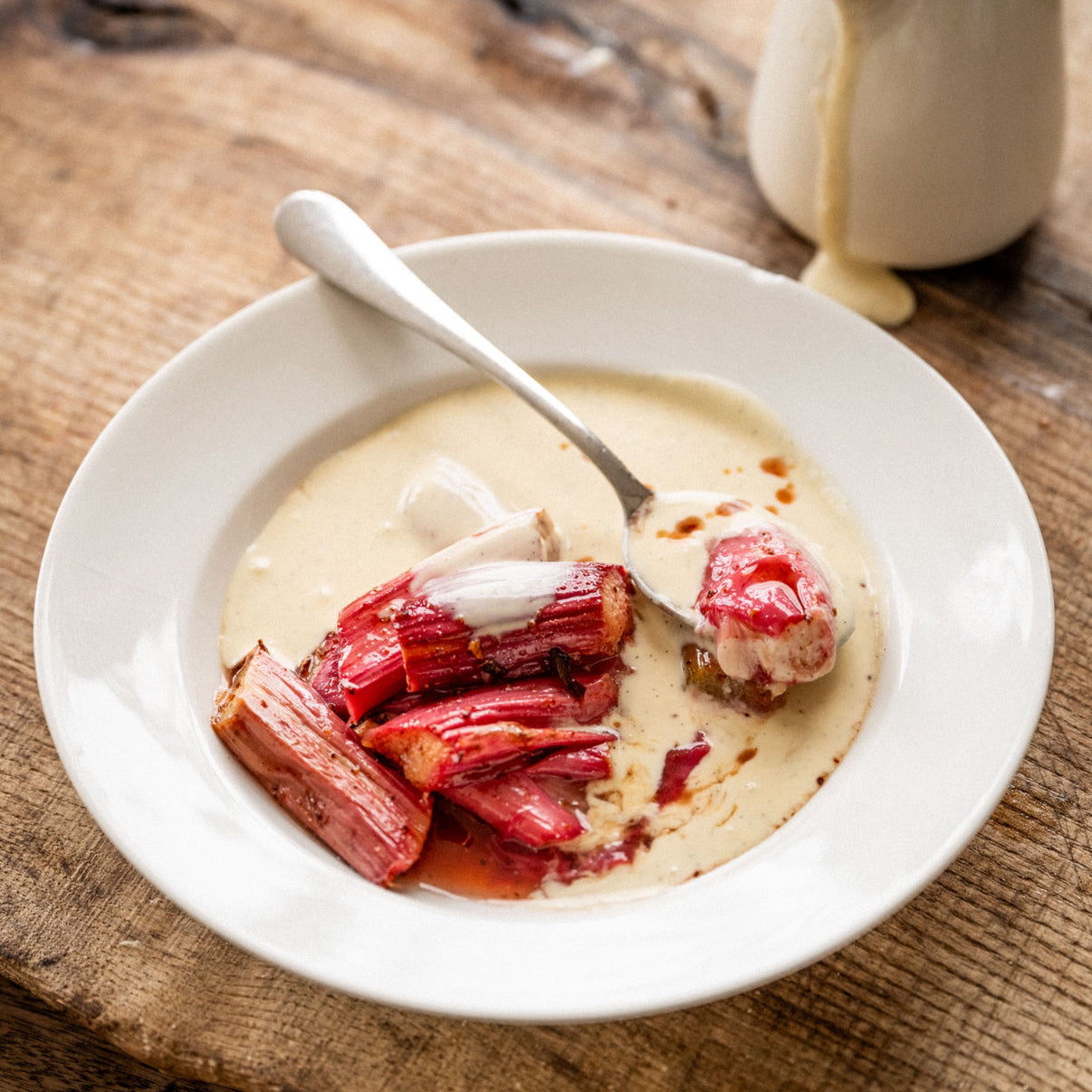 Roast rhubarb with honey and star anise served with thick homemade custard