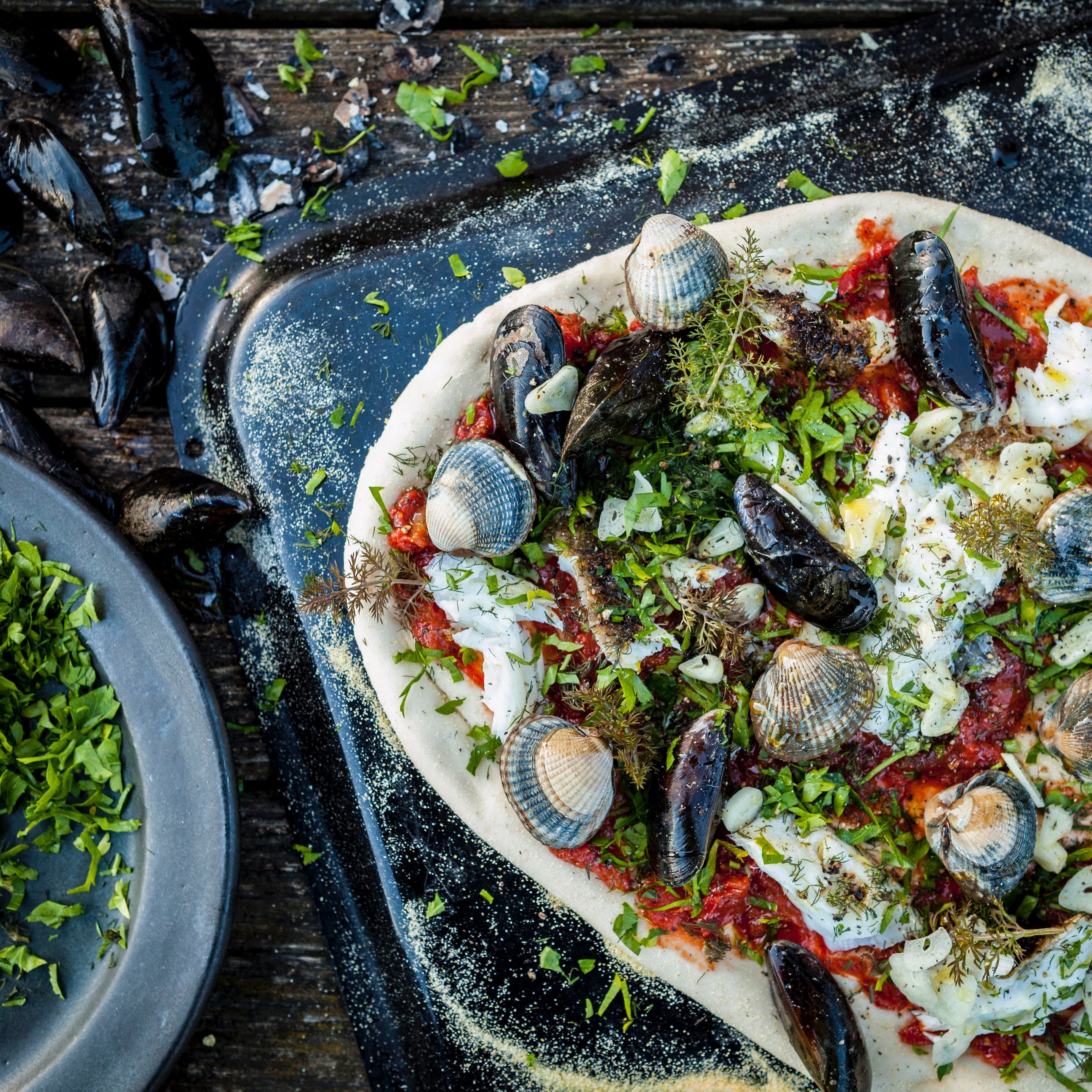 Seafood pizza with mussels and cockles