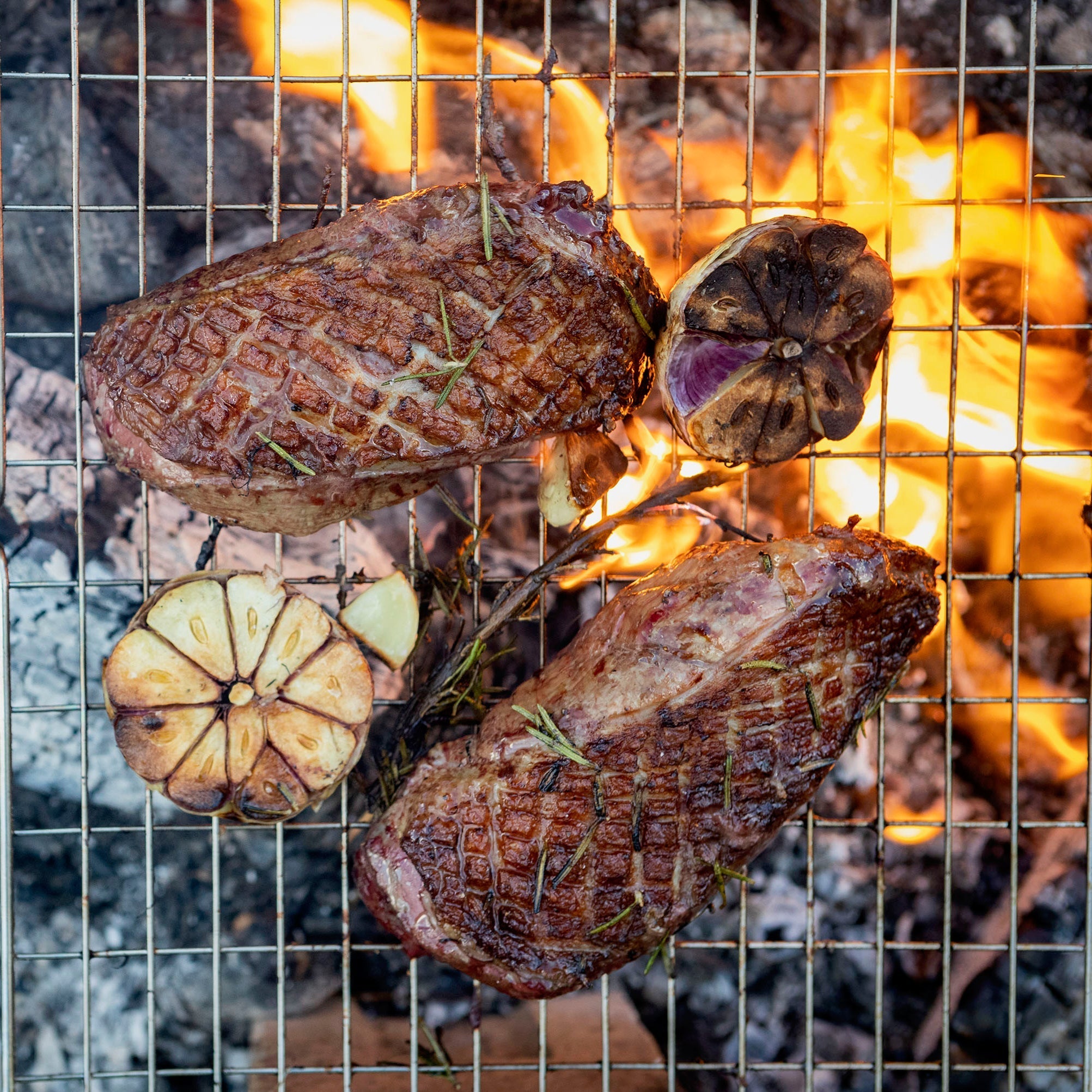Grilled duck breasts with rosemary and garlic