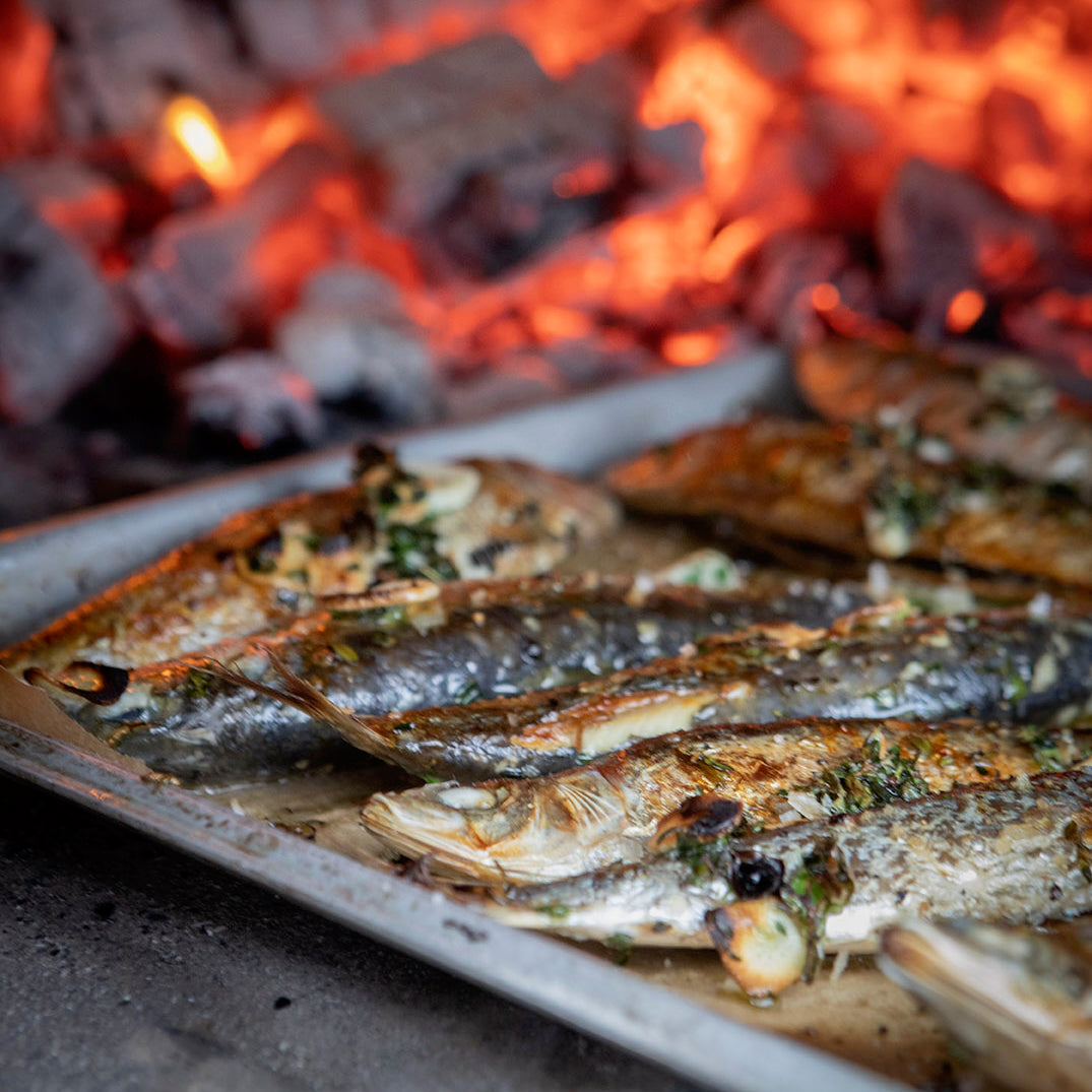 Wood-roast sardines with herbs and garlic