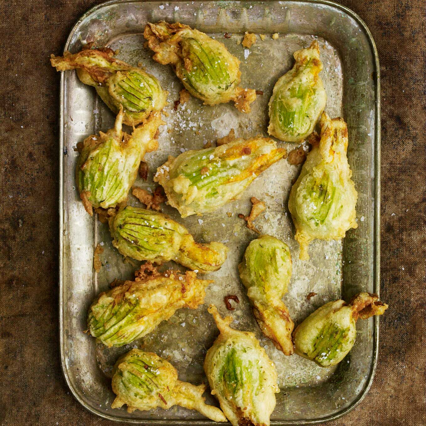Courgette flowers filled with peas, dill and mint