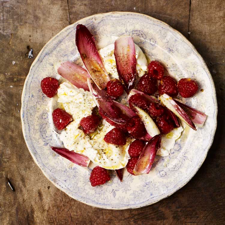 Raspberries with chicory, olive oil and burrata