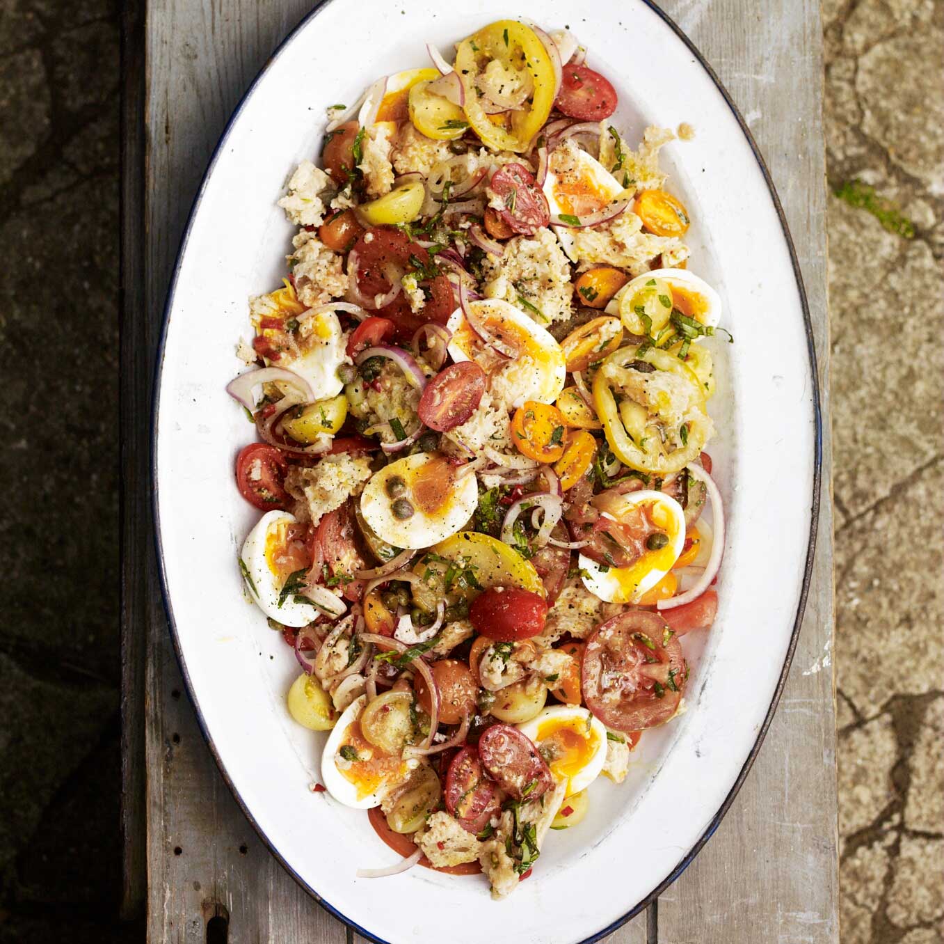 Tomato, egg, bread and herb salad