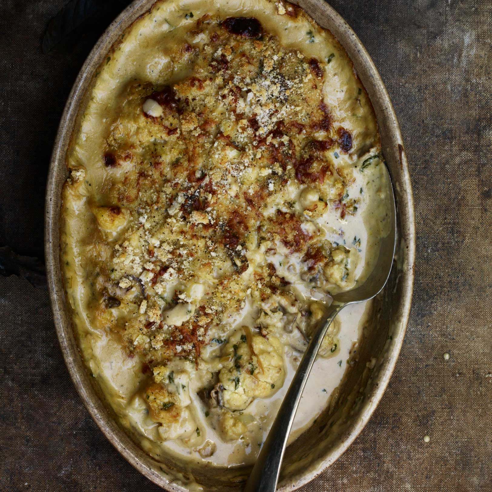 Cauliflower cheese gratin with ceps and parsley