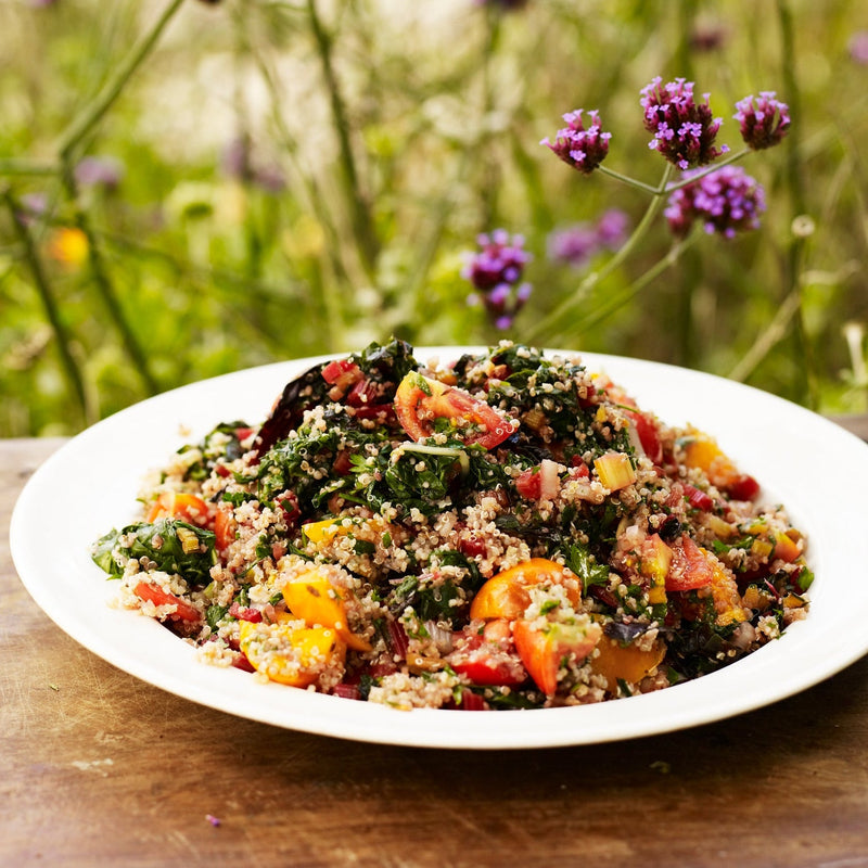 Chard with garlic, quinoa, tomatoes and parsley