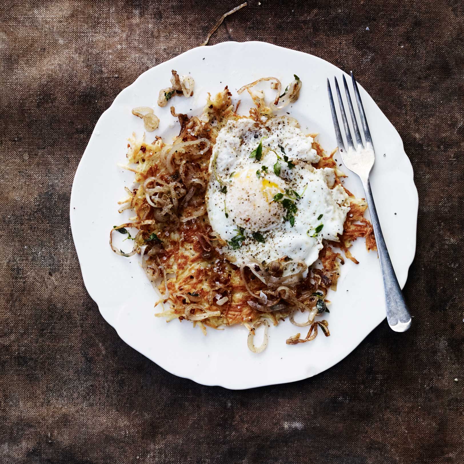 Parsnip and fenugreek rostis with chilli, shallots and fried eggs