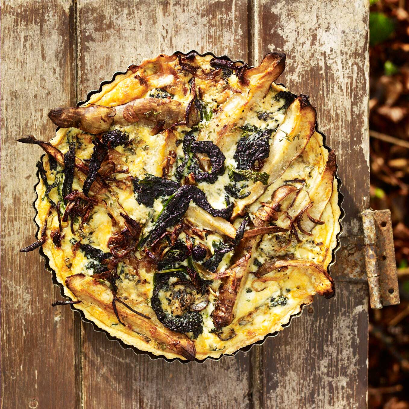 Jerusalem artichoke, kale and blue cheese tart
