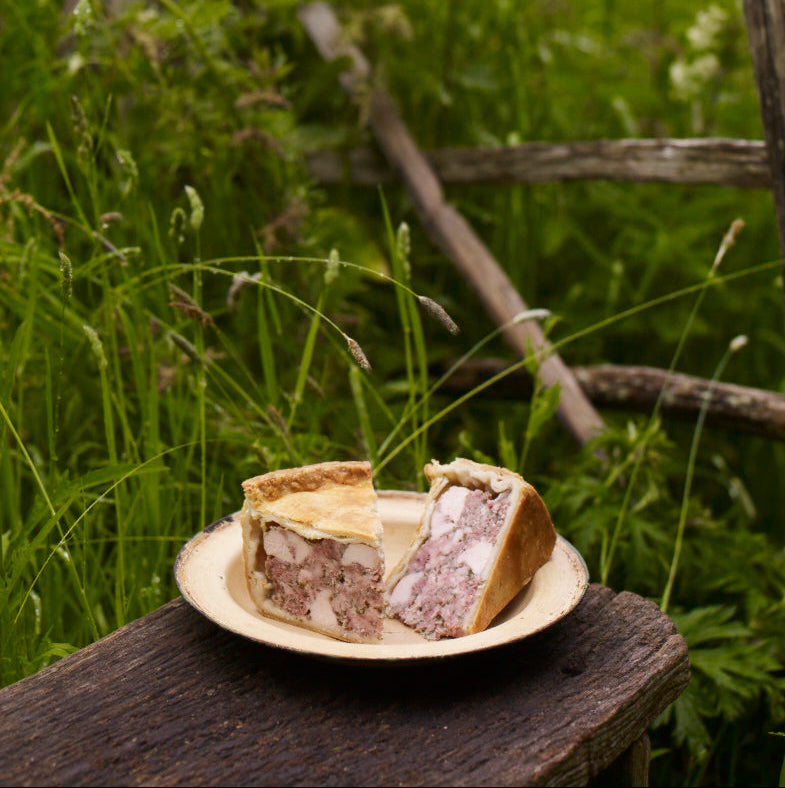 A raised pork, chicken and parsley pie