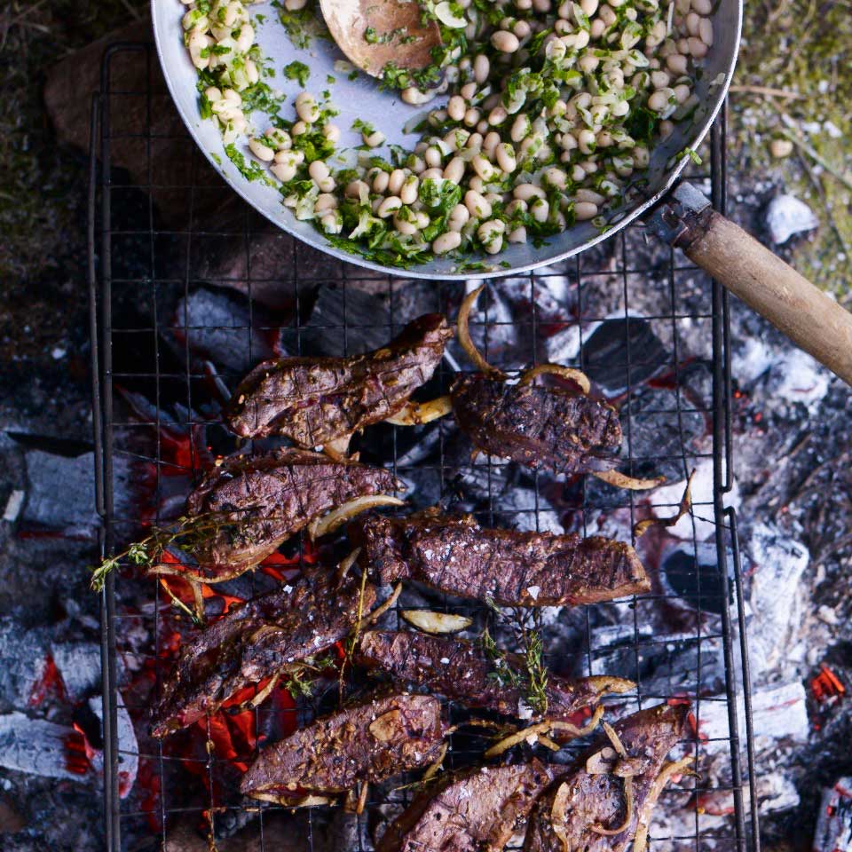 Seared spiced lamb’s liver with white beans, garlic and parsley