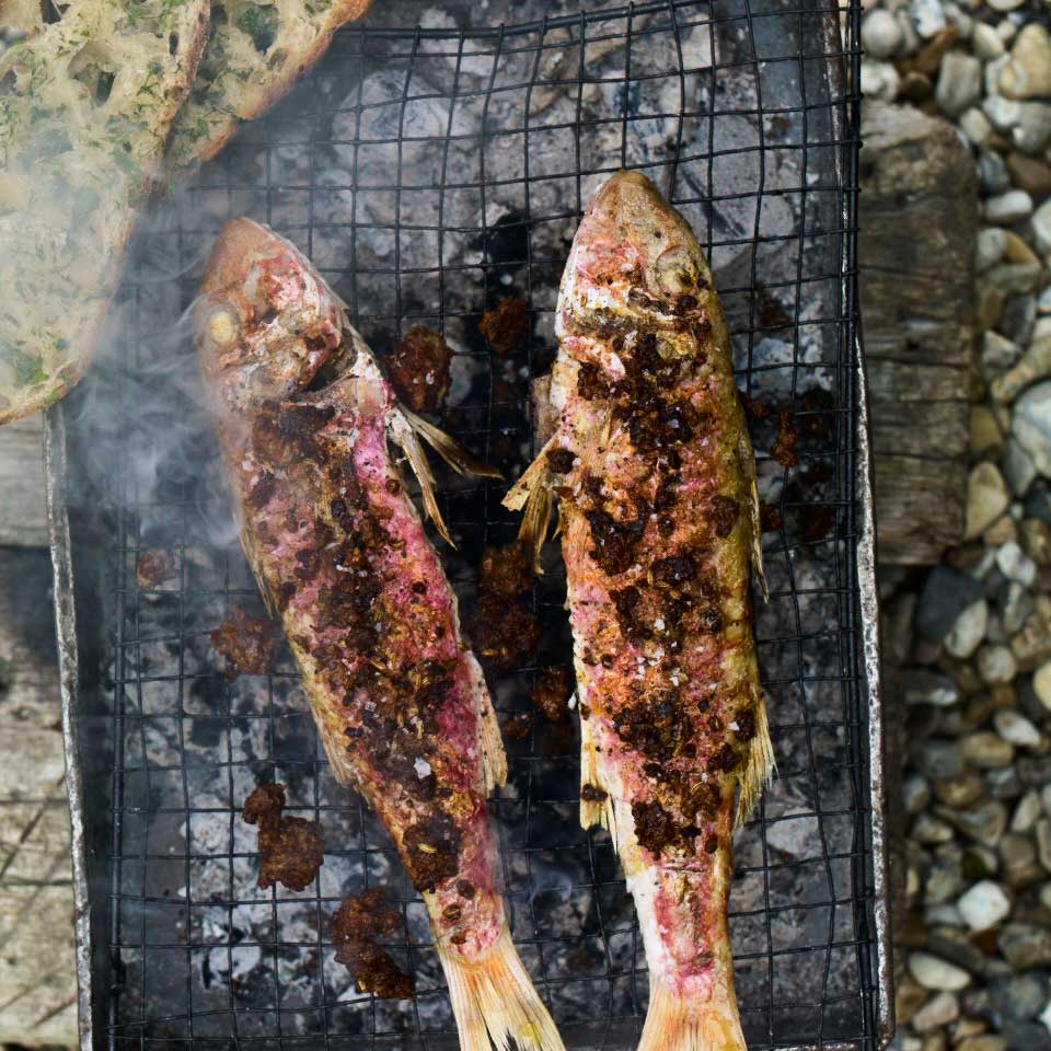Barbecued red mullet with chorizo and parsley toasts