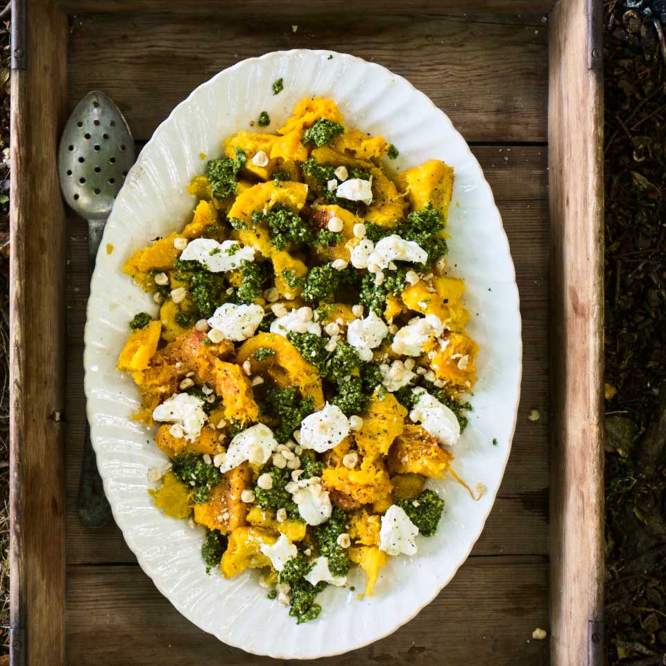Ember-baked squash with kale pesto