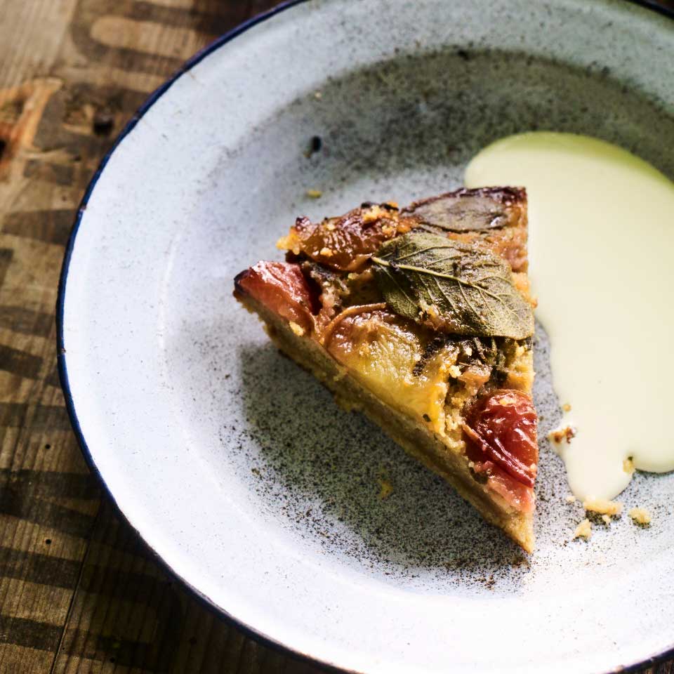 Sticky plum, sage and almond upside-down cake
