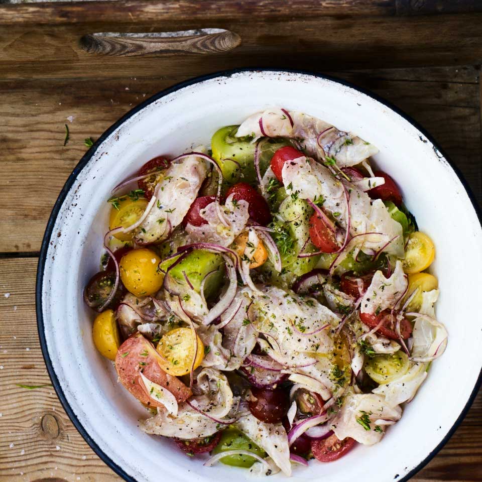 Cured fish and tomatoes with red onion, garlic and thyme