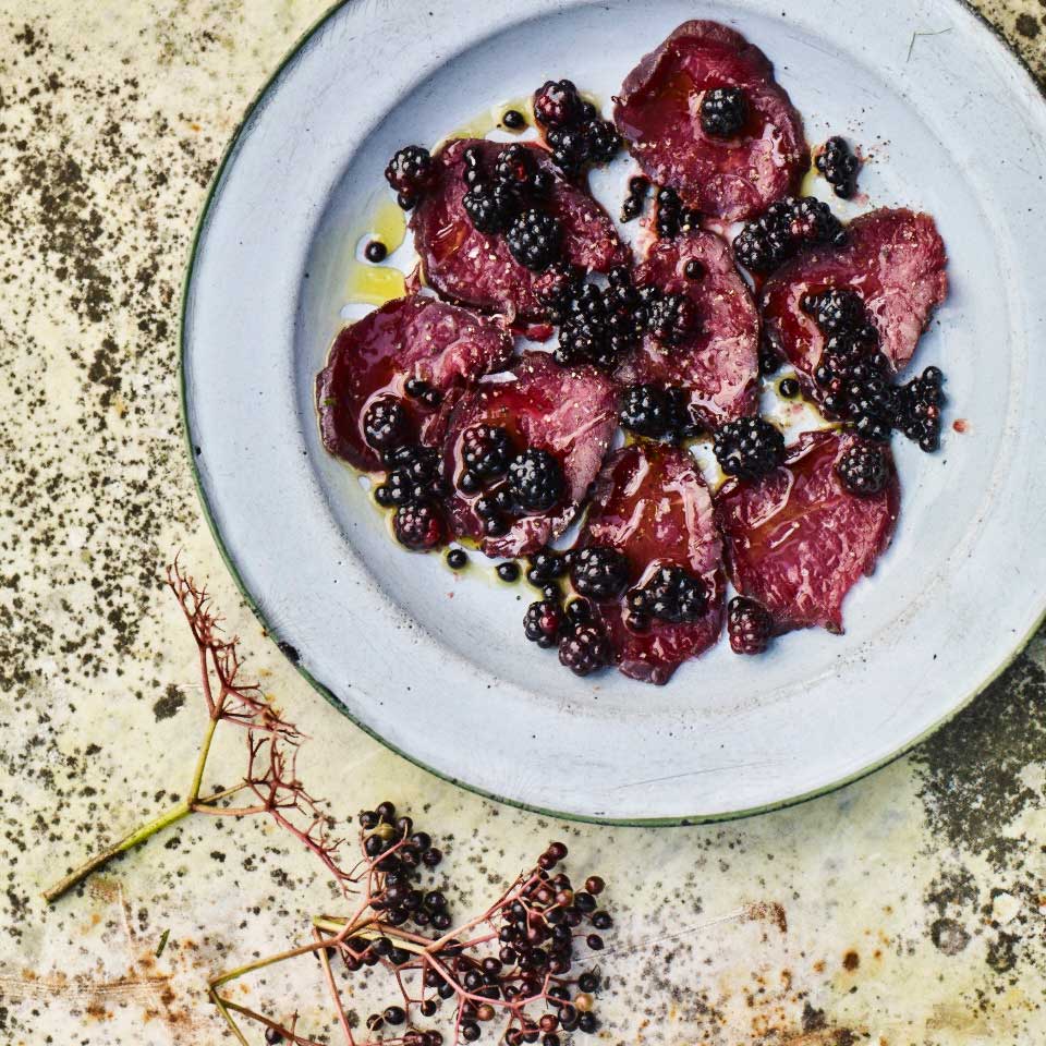Venison cured with blackberries, elderberries, juniper and bay