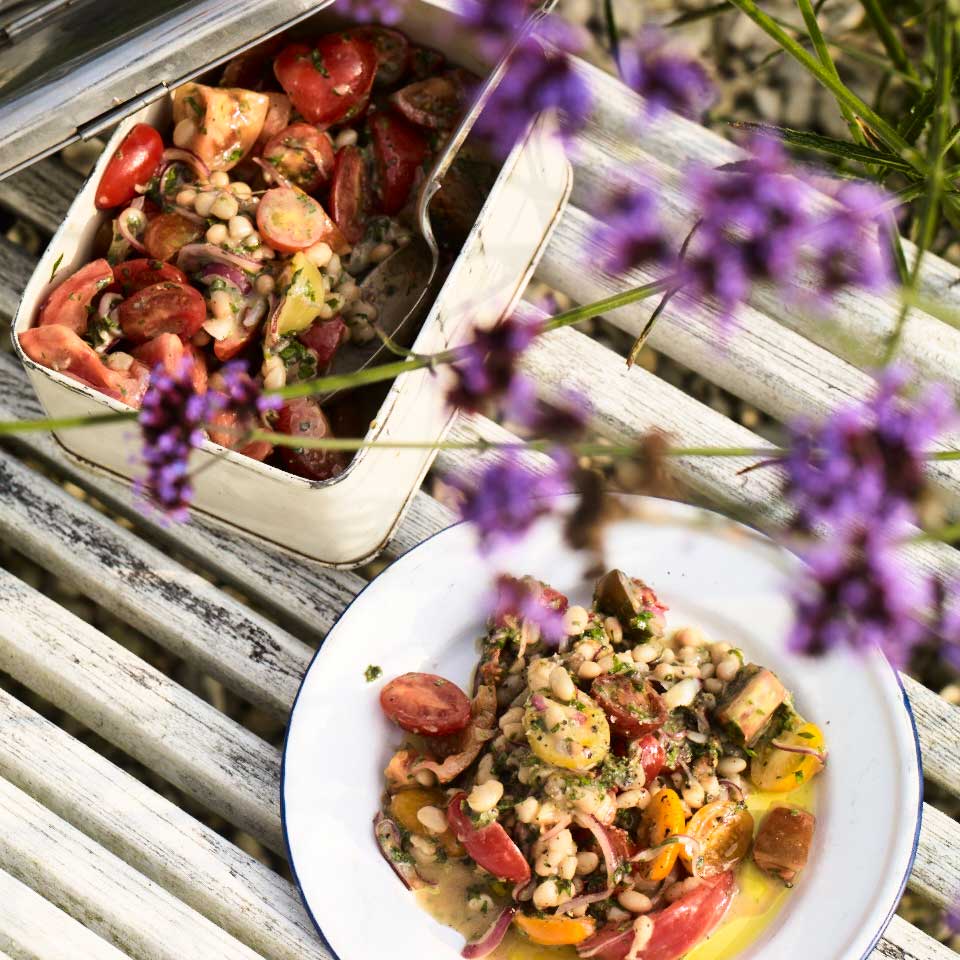Tomato and bean salad with anchovies, red onion and herbs