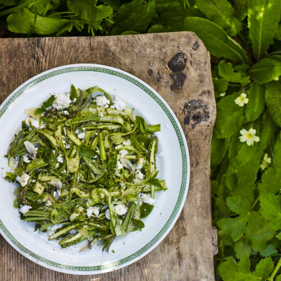 Raw asparagus with mint, lemon, goat’s cheese and pea tops