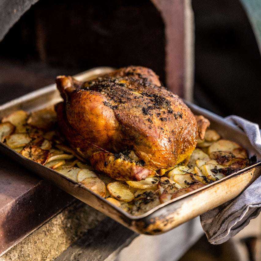 Roast chicken with herbs, potatoes and aïoli