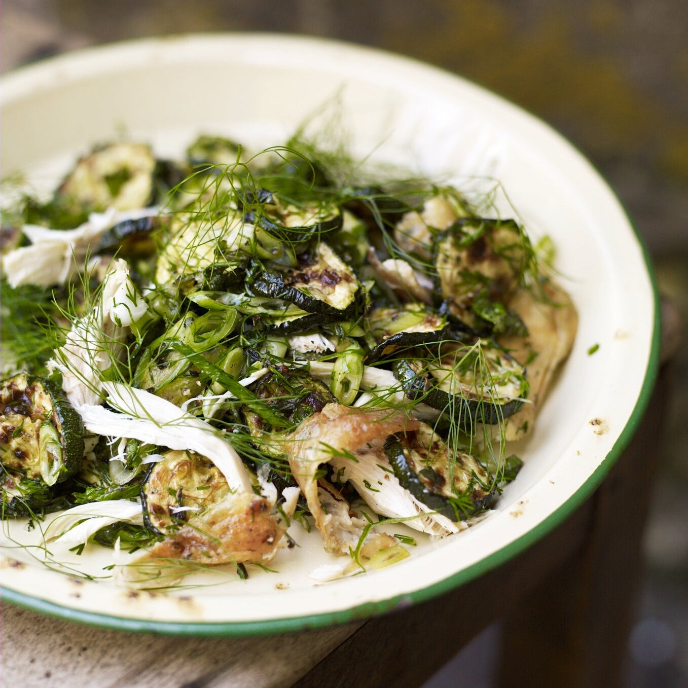 A salad of courgettes, chicken, dill, spring onions and mint