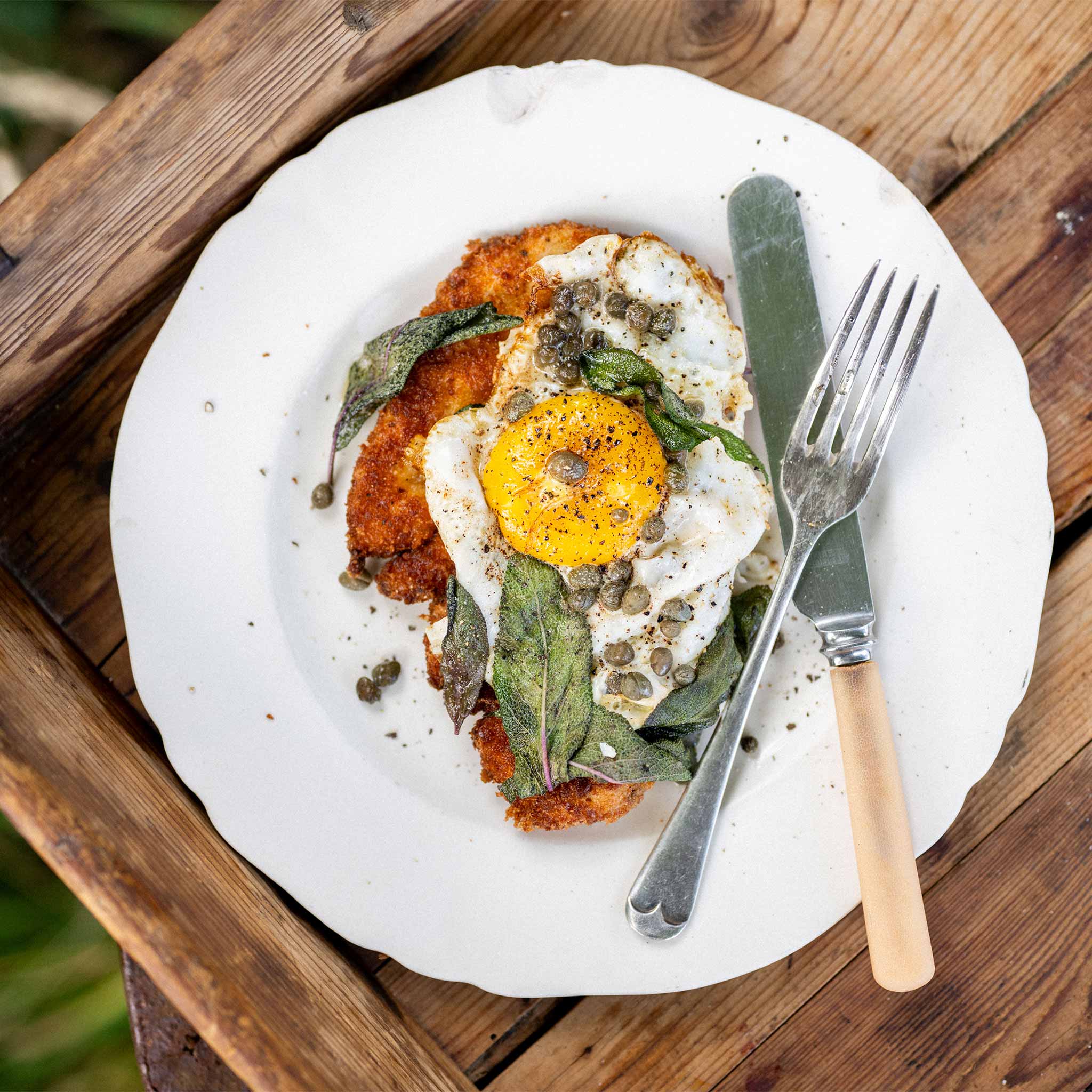 Crispy chicken escalope with capers and sage