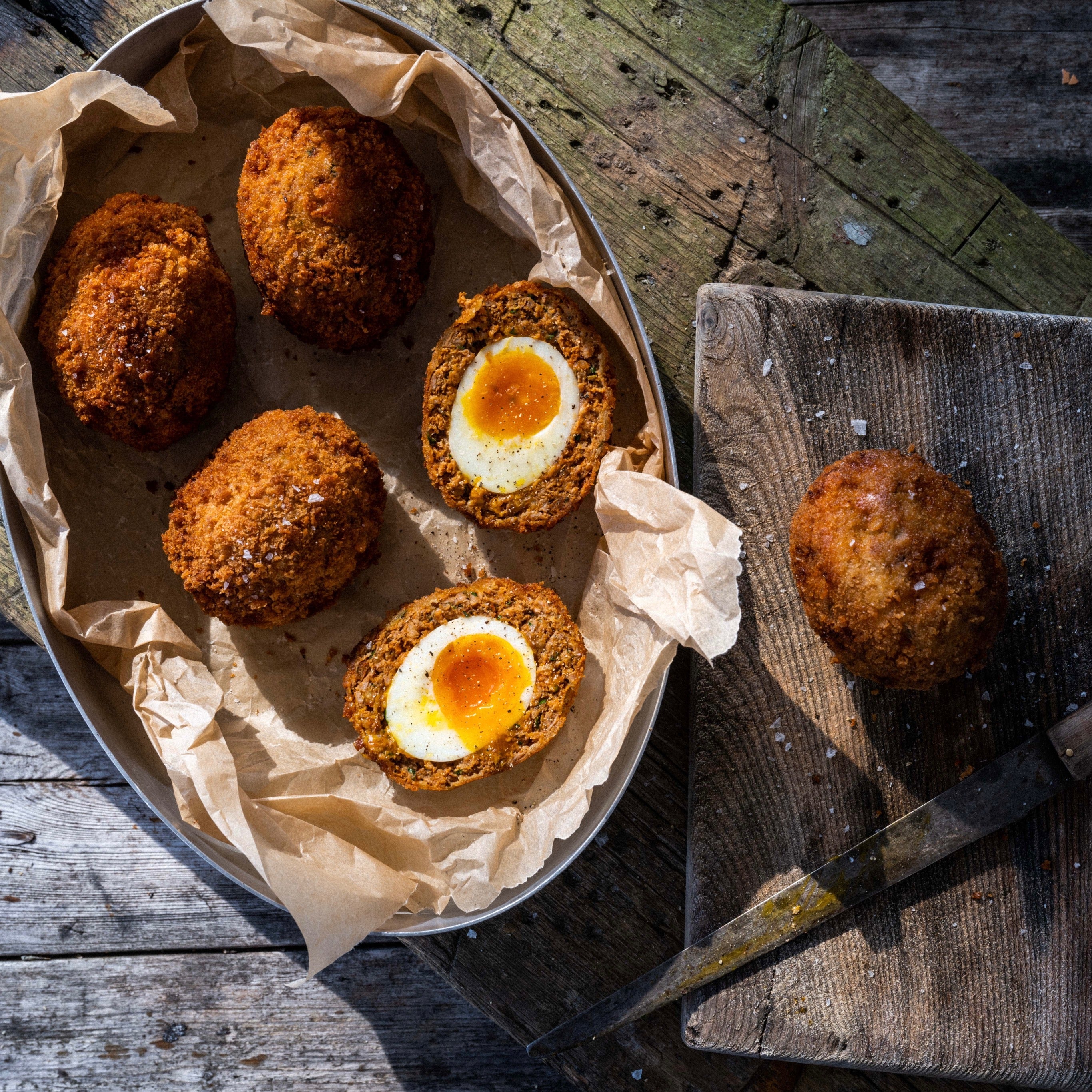 Chorizo Scotch eggs on a plate
