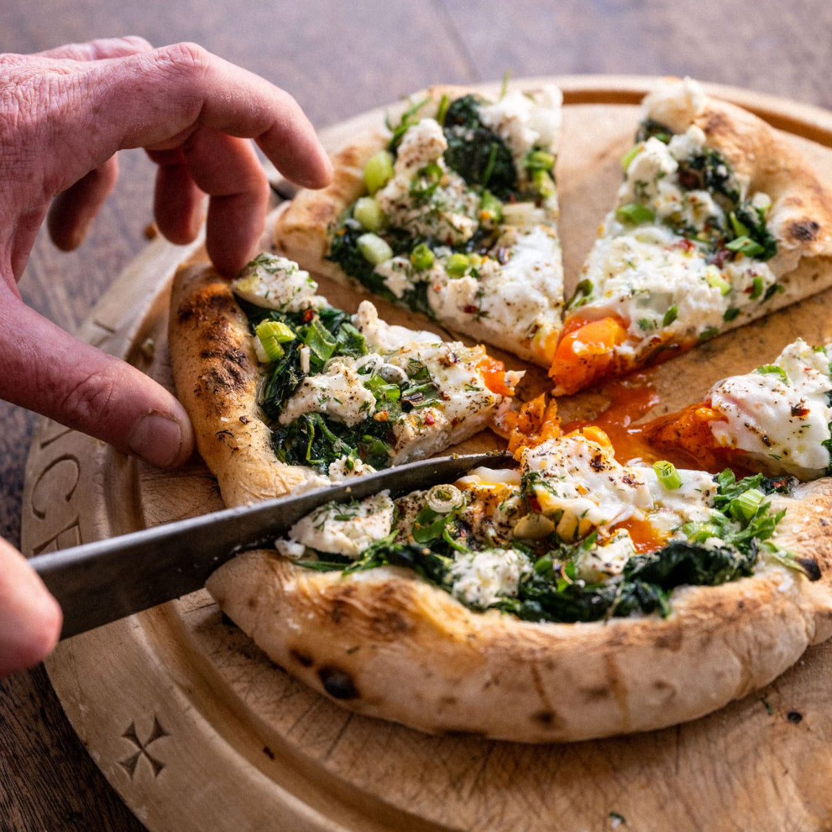 Ricotta and spinach pizza with dill, spring onions and an egg (if you like)
