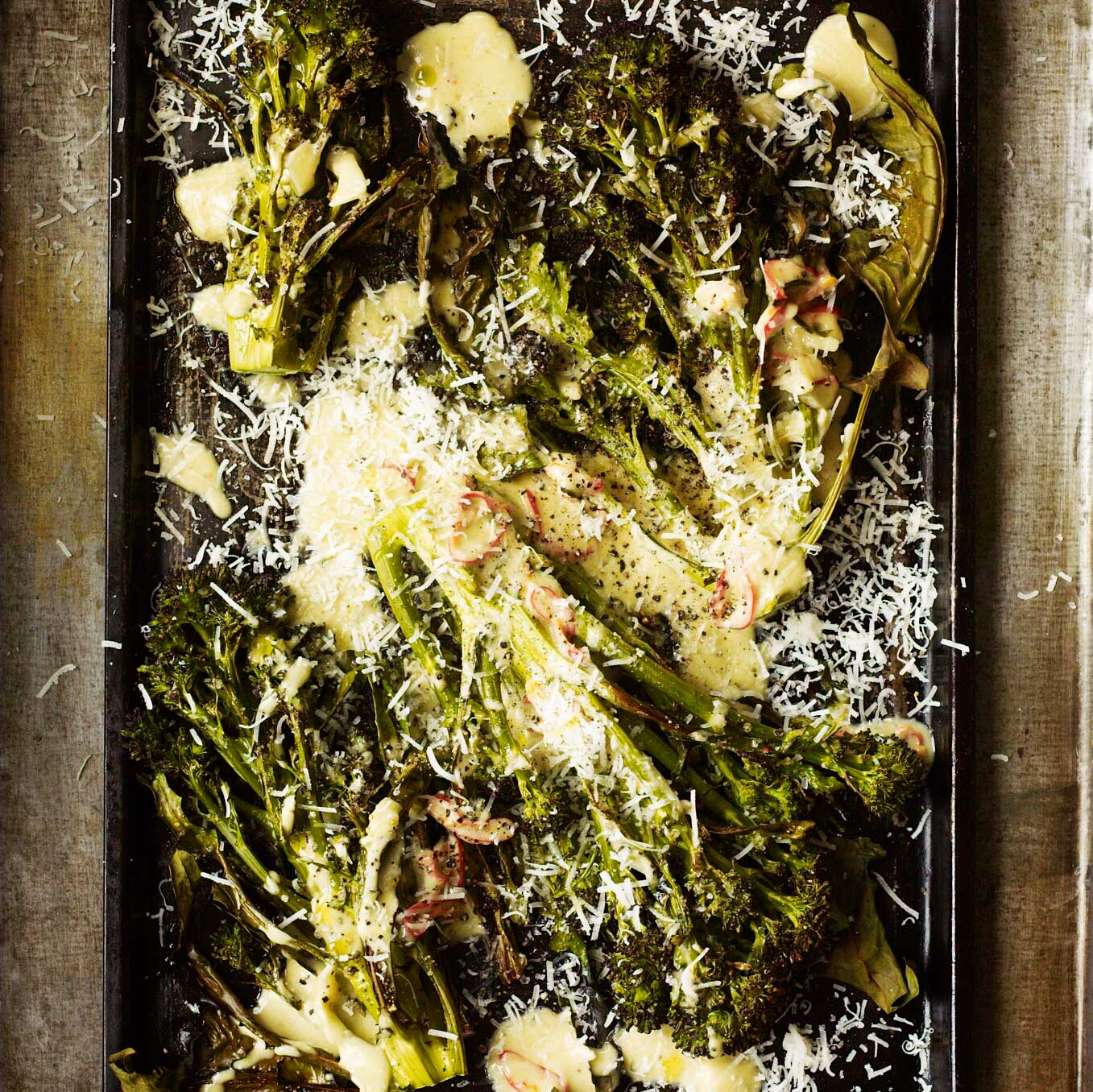 Roast purple sprouting broccoli with anchovy, cream, chilli & parmesan