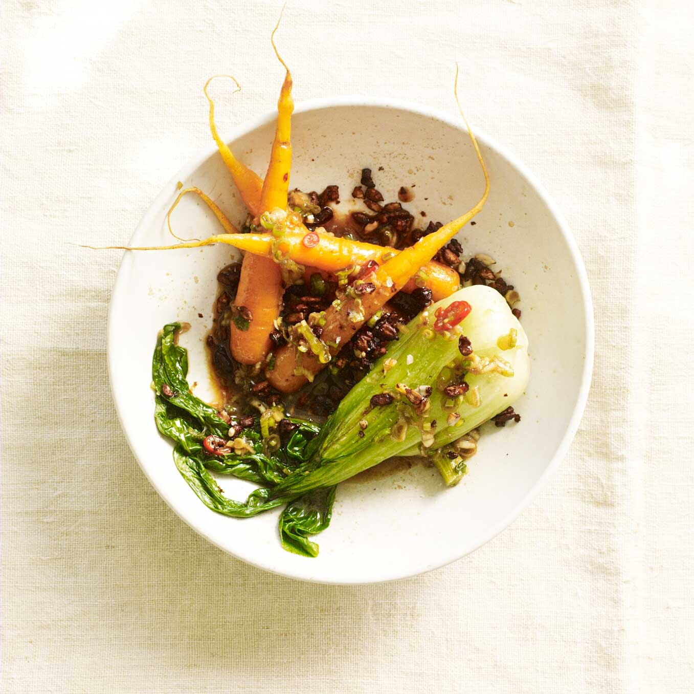 Steamed spring vegetables with tamari, honey & sunflower seeds