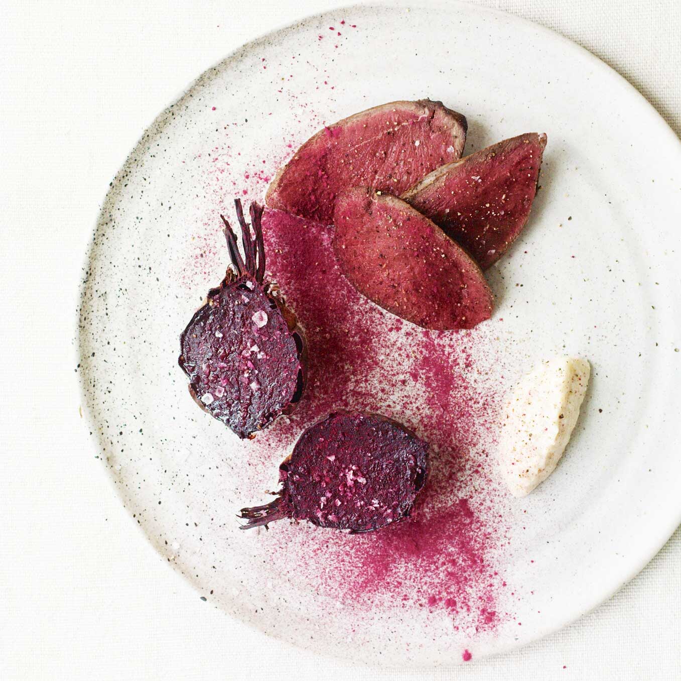 Wood pigeon cured in apple with salt-baked beetroot & horseradish
