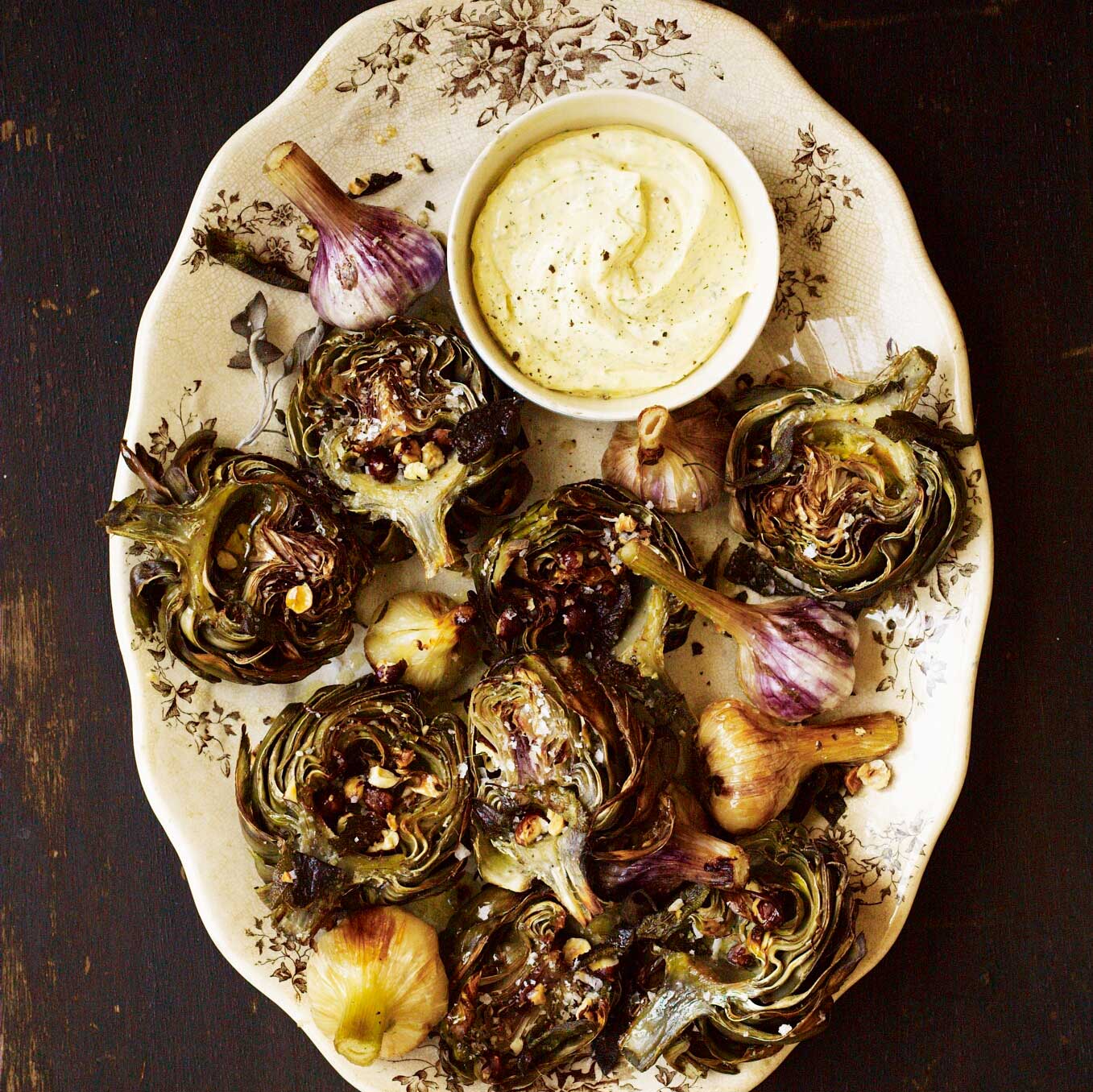 Roast artichokes with garlic, sage, hazelnuts & lemon & fennel mayo