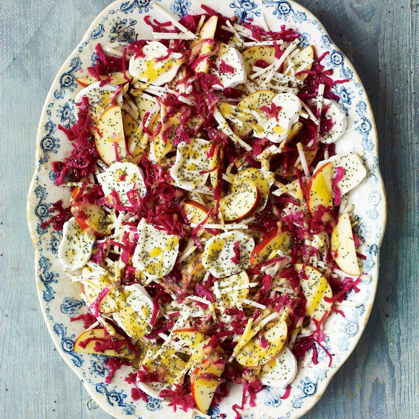 Fermented cabbage, apple & celeriac salad with chia seeds & goat’s cheese