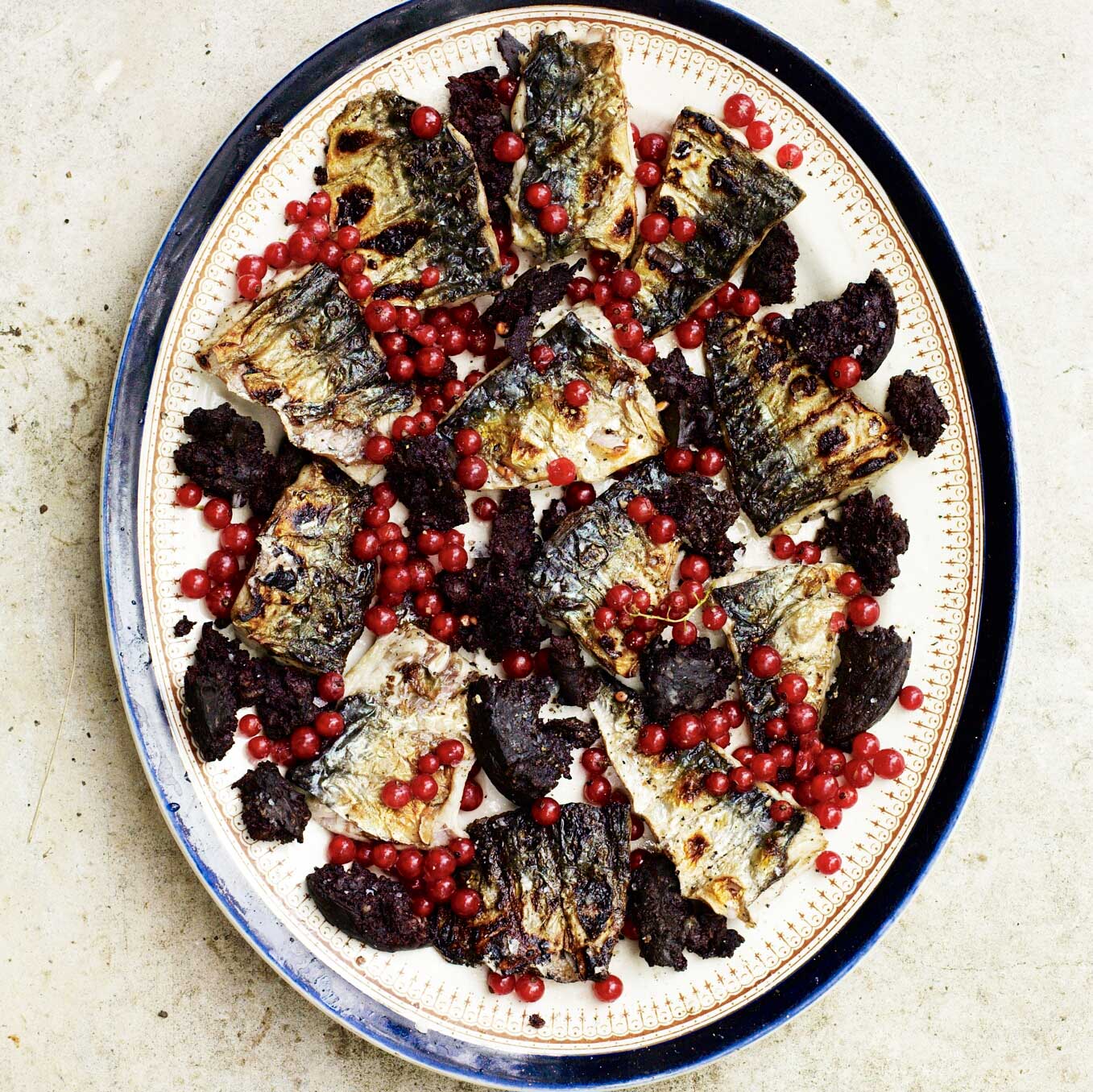 Barbecued mackerel with black pudding & redcurrants