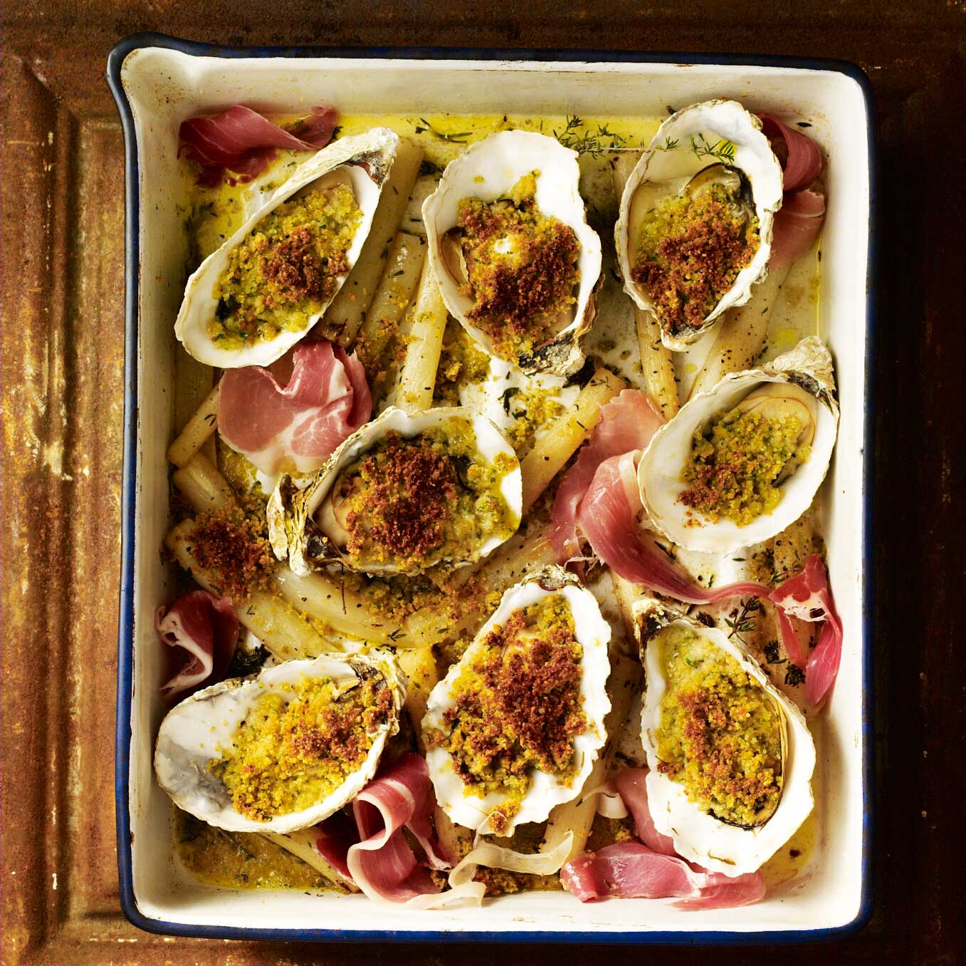 Grilled oysters with salsify & ham