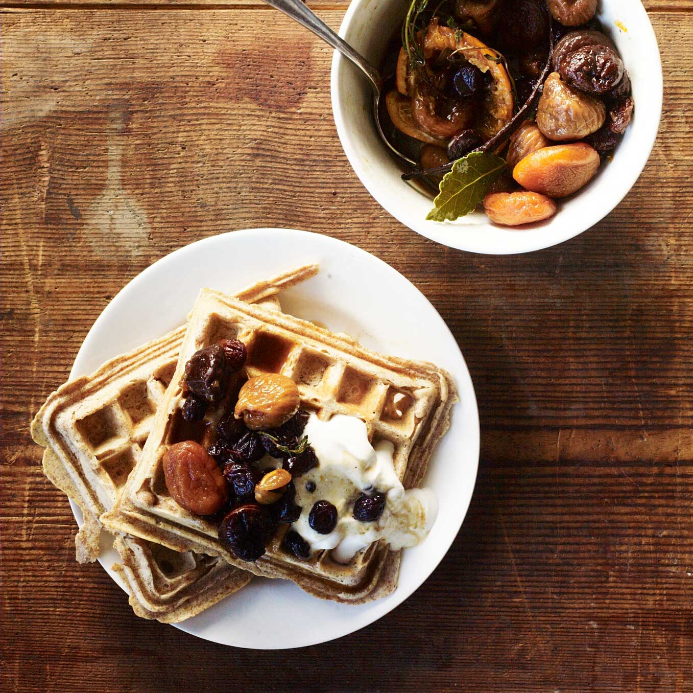 Spelt waffles with fruit in tea, cardamom & honey